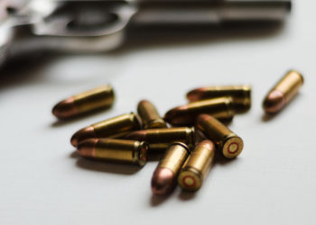 Congressman Comes Under Fire for Christmas Photo Where Family Poses with Guns Amid Michigan Shooting