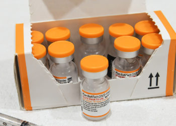 Pfizer Says COVID-19 Vaccine Booster Shot Improves Protection Against Omicron Variant