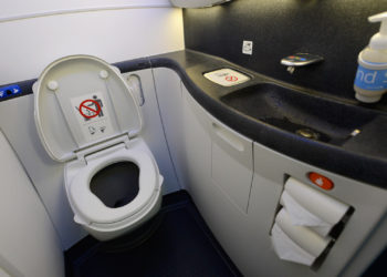 A Michigan Woman Quarantined in Airplane Bathroom for 5 Hours After Testing Positive for COVID-19 Mid-Flight
