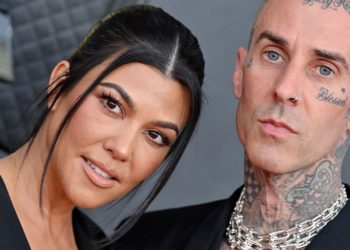 Travis Barker Hits Back at Troll Who Mocked PDA with Kourtney Kardashian