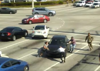 Video Shows People Stopping Car Passing Through Busy Intersection After Driver Suffers ‘Medical Episode’