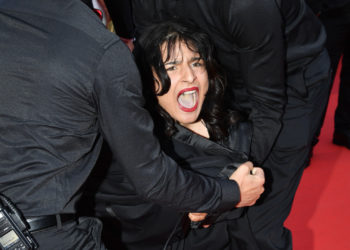 Topless Activist Protests Sexual Violence Against Ukrainian Women on Cannes Red Carpet