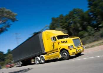 Ontario Provincial Police Investigating Video of Man Hanging Off Truck On Highway